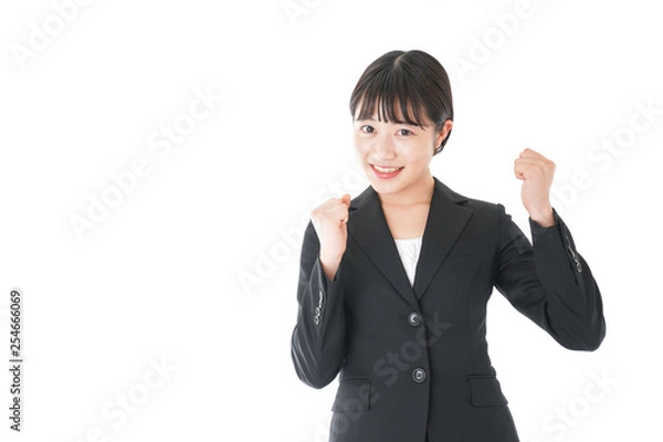 Fototapeta ガッツポーズをするビジネスウーマン