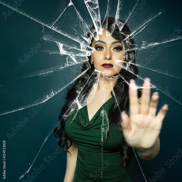 Obraz Beauty touching shattered glass