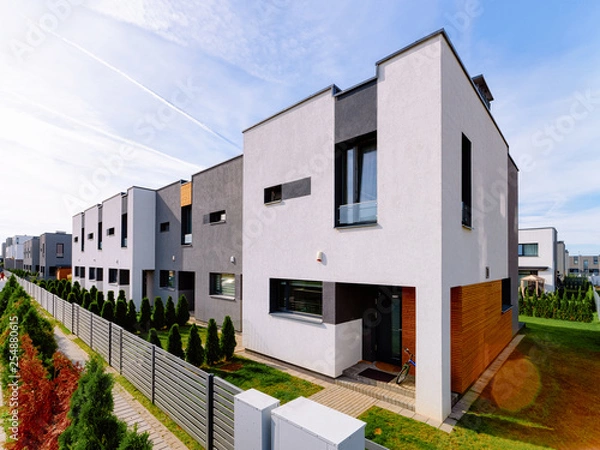 Obraz Apartment residential house building complex with gate sun light