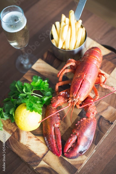 Obraz Cooked lobster with fries