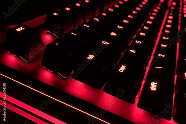 Fototapeta PC keyboard with red light (selective focus)
