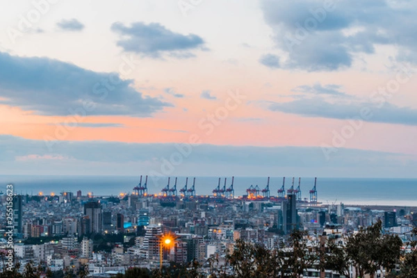 Fototapeta This is a capture of the sunset in Beirut capital of Lebanon with a warm orange color and cool tone cloud and you can see Beirut port in the picture.