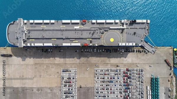 Fototapeta Aerial top view Large RoRo (Roll on/off) Car or Vehicle carrier vessel loading car for shipping to worldwide. 