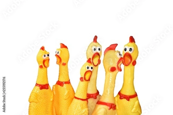 Fototapeta Wiele zabawnych zabawek kurczaka różnej wielkości na na białym tle.