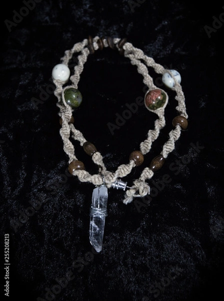 Obraz necklace on black background