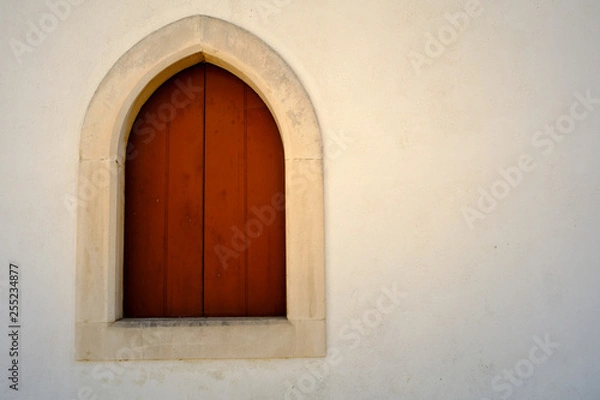 Fototapeta An amazing window in portugal in a sunny day.