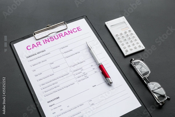 Fototapeta Car insurance form near glasses, calculator, pen on black background
