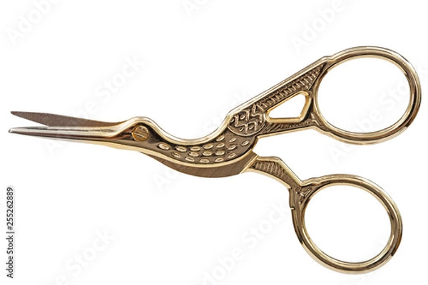 Fototapeta Scissors with curly handles in the shape of a bird, with clipping path, isolated on white background