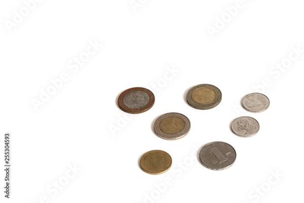 Fototapeta Coins isolated on a white background of different values
