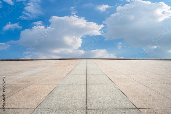 Fototapeta Empty square tiles and beautiful sky scenery