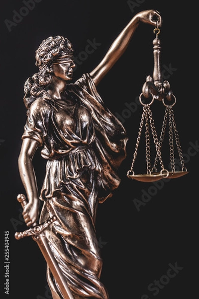 Fototapeta Themis statue holding a scale