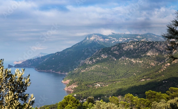 Fototapeta view from the tower to the sea and mountains; mountains overgrown with forests; scenic resting places