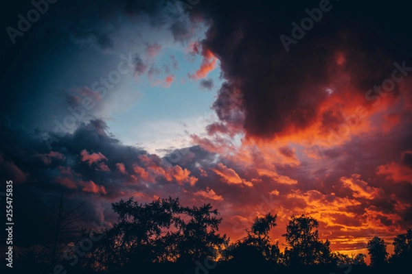 Fototapeta Sunset and thunderstorm