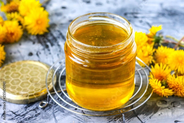 Obraz Honey from dandelions. Dandelion Honey in a Glass Jar.