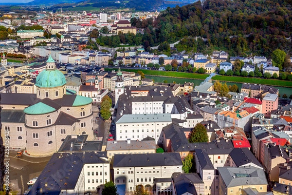 Fototapeta Scenic view opening from Hohensalzburg fortress in Salzburg to the rooftops of the houses and the city