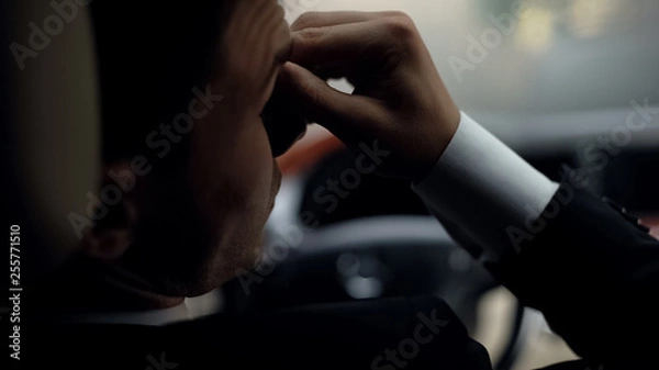 Fototapeta Driver with eyesight problem suffering eyestrain, tired after busy day, pressure