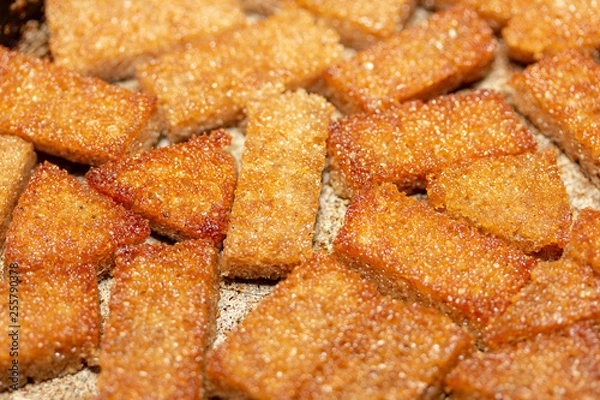 Fototapeta A delicious and flavorful fried slices of bread