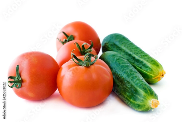 Obraz red tomatoes and green cucumbers