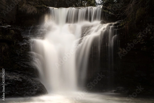 Fototapeta Scene with long exposure waterfall in autumn