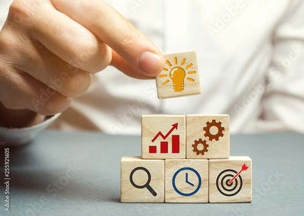 Fototapeta Businessman forms a business strategy. The concept of developing innovative technologies. Action plan, management, research, marketing. The goal to increase and maximize profit. Enterprise development