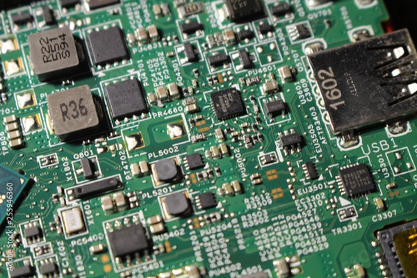 Fototapeta Closeup view at laptop motherboard and semiconductors components