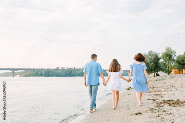 Fototapeta happy family on the beach