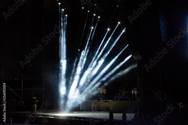 Fototapeta  Lights on open air stage afternoon and evening, musical concert, powerful light visual impact color, visual technology in Latin America.