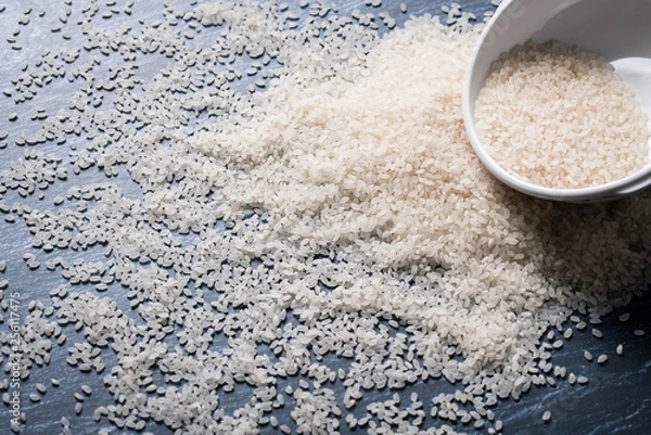Obraz close up raw rice on table