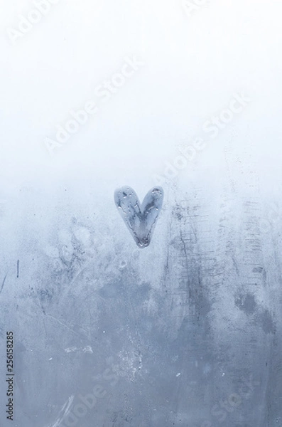 Fototapeta  a drawn heart on the foggy window