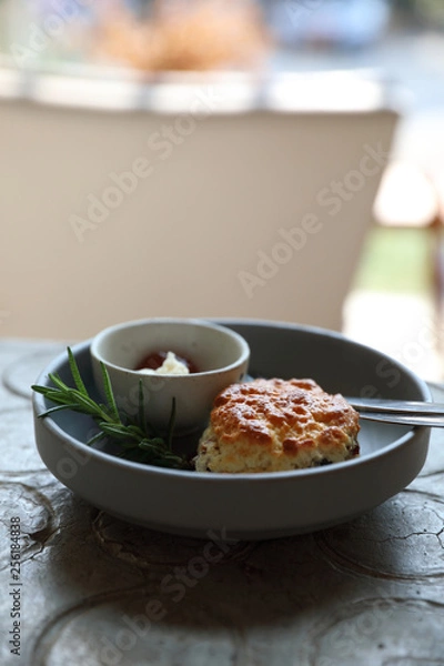 Obraz Scones with cream and strawberry jam