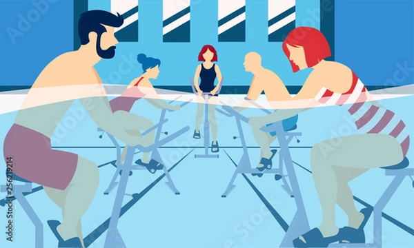 Fototapeta People doing aquacycling exercises in a pool.