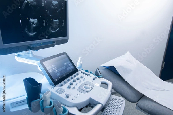 Fototapeta Sonographie Gerät mit Monitor, Tatstatur und Benutzerpanel in der Radiologie, Textfreiraum