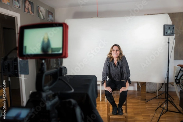 Obraz Videoblogger working on creating her videos