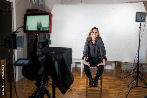 Obraz Videoblogger working on creating her videos