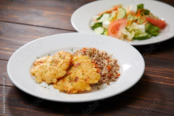 Fototapeta fried chicken breast with buckwheat and salad