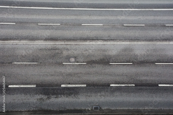 Fototapeta road with asphalt pavement and markings, top view