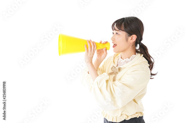 Fototapeta 応援をする若い女性