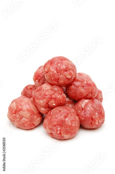 Obraz pyramid of raw meat-balls on white