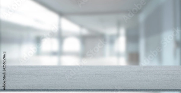 Fototapeta Empty stone table with blurred soft light factory business background. product display template. Mock up template for display. Business presentation.