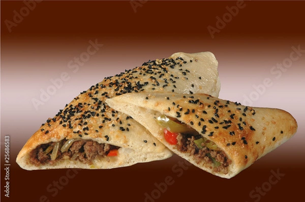 Fototapeta Teigtasche mit Fleisch