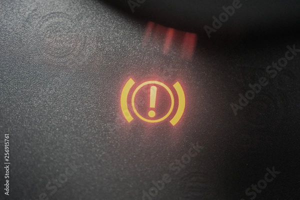 Obraz Handbrake warning light sign illuminated close up