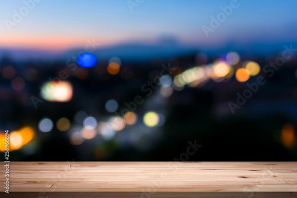 Fototapeta empty table from a light wood with bokeh background