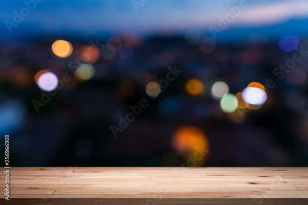 Fototapeta empty table from a light wood with bokeh background