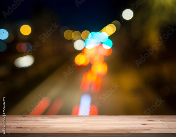 Fototapeta empty table from a light wood with bokeh background