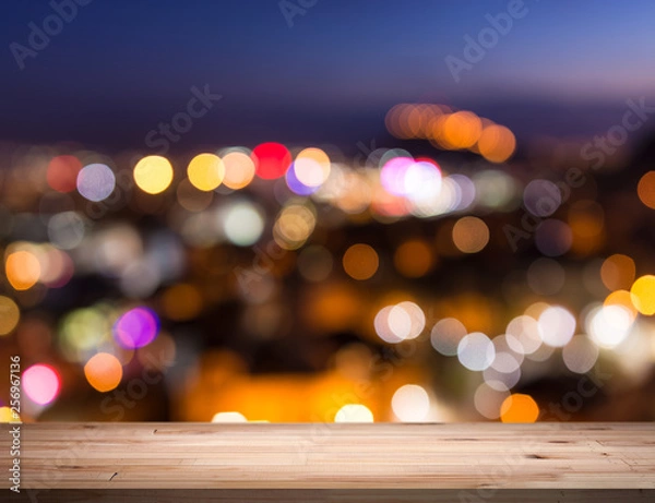 Fototapeta empty table from a light wood with bokeh background