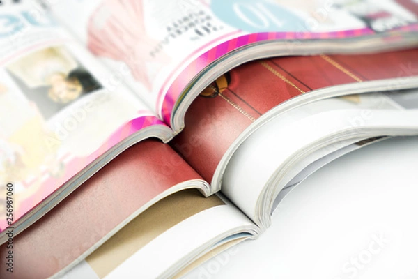 Obraz Stack of magazines on isolated white background