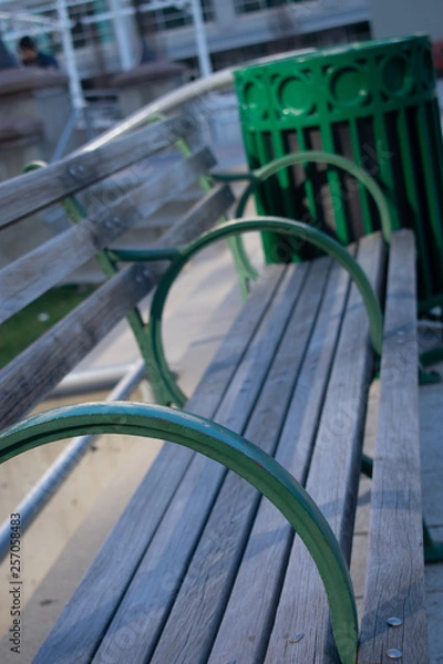 Fototapeta Green Bench and Trash Can
