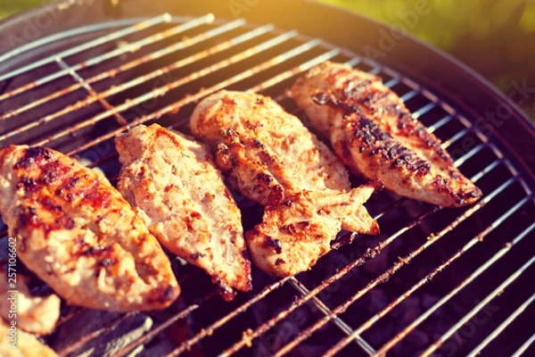 Obraz Grilled chicken breast on barbeque