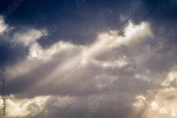 Obraz clouds with beam of light