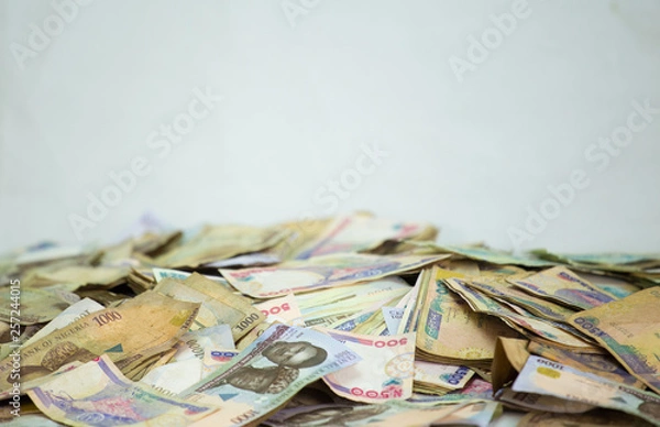 Fototapeta Nigerian Currency - A heap of nigeria naira notes